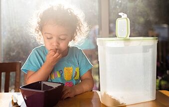 Child with storage container