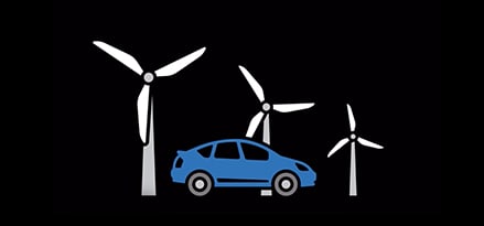 blue car near windmills