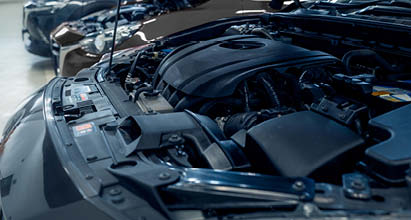 image feature an open hood of a vehicle