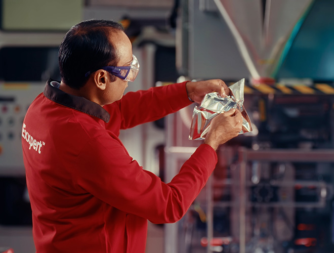 Signature polymers Exxpert inspecting Packaging