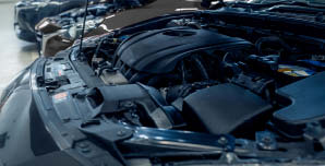 image feature an open hood of a vehicle
